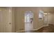 Hallway view into the kitchen and back porch with wooden floors at 217 Bridgewater Trl, Canton, GA 30115