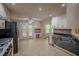 Cozy kitchen featuring stainless steel appliances and ample counter space, great for cooking and entertaining at 217 Bridgewater Trl, Canton, GA 30115