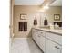 Bathroom featuring granite countertop, towel racks, and tiled floors at 6300 Blackwater Trl, Atlanta, GA 30328
