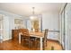 Casual dining area with wood table, chairs and nearby storage at 6300 Blackwater Trl, Atlanta, GA 30328