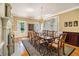 Formal dining area with large windows providing natural light and views of the outdoors at 6300 Blackwater Trl, Atlanta, GA 30328