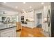 Modern kitchen with stainless steel appliances and a functional layout for easy meal preparation at 6300 Blackwater Trl, Atlanta, GA 30328