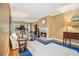 Bright living room with a fireplace, hardwood floors and comfortable furnishings at 6300 Blackwater Trl, Atlanta, GA 30328