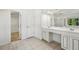 Bathroom features double vanity, tub, and separate walk-in closet at 2761 Valley Spring Dr, Lawrenceville, GA 30044