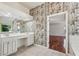 Bathroom featuring a double vanity and decorative wall art at 2761 Valley Spring Dr, Lawrenceville, GA 30044