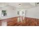 Primary bedroom with hardwood floors and an ensuite bathroom at 2761 Valley Spring Dr, Lawrenceville, GA 30044