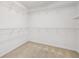 Walk-in closet with wire shelving offers ample storage space at 2761 Valley Spring Dr, Lawrenceville, GA 30044