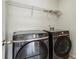 Modern laundry room equipped with high-end Samsung washer and dryer at 2761 Valley Spring Dr, Lawrenceville, GA 30044