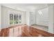 Bright living room offers wood floors, a large window, and ample space at 2761 Valley Spring Dr, Lawrenceville, GA 30044