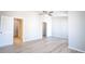 A light-filled bedroom with a ceiling fan and vinyl plank flooring at 3165 Creston Park Ct, Duluth, GA 30096