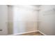 A walk-in closet is freshly painted with wire shelving and hardwood floors at 3165 Creston Park Ct, Duluth, GA 30096