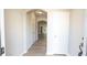 Bright entryway with wood-look floors leading to an open living area; fresh and welcoming at 3165 Creston Park Ct, Duluth, GA 30096