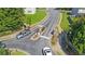 Aerial view of the community entrance, with stone accents and black metal gates at 3165 Creston Park Ct, Duluth, GA 30096