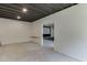 Unfinished basement with exposed ceilings and an open layout, ready for customization at 4208 Sierra Creek Ct, Hoschton, GA 30548