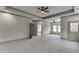 Spacious main bedroom featuring neutral paint, carpet, trey ceiling, recessed lighting, and natural light at 4208 Sierra Creek Ct, Hoschton, GA 30548