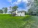 Spacious backyard featuring a two-story home with a deck, perfect for outdoor enjoyment at 10307 E Cherokee Dr, Canton, GA 30115