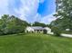 Beautiful single-story home with landscaped front yard and attached garage, great for Gathering living at 10307 E Cherokee Dr, Canton, GA 30115