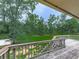 Lovely back deck overlooking a sprawling backyard, providing a serene outdoor living space at 10381 E Cherokee Dr, Canton, GA 30115