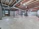 Spacious unfinished basement with block walls, a utilitarian space ready to be customized at 10381 E Cherokee Dr, Canton, GA 30115