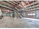 Large unfinished basement space with exposed ceiling, ready for customization and storage at 10381 E Cherokee Dr, Canton, GA 30115