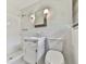 Bright bathroom featuring a white sink vanity, and tile shower with a shower head at 10381 E Cherokee Dr, Canton, GA 30115