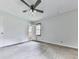 Bedroom with ceiling fan, and natural light from a window at 10381 E Cherokee Dr, Canton, GA 30115