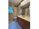 Classic bathroom features a large vanity, neutral-toned walls, and a garden window, blending function and relaxation at 160 Eastlake Nw Pt, Kennesaw, GA 30144