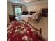 Bright bedroom featuring a queen-sized bed, neutral carpet, and natural light, offering a peaceful retreat at 160 Eastlake Nw Pt, Kennesaw, GA 30144