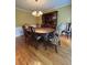 Elegant dining room features a classic chandelier, a wooden dining table, and stylish chairs, perfect for Gathering gatherings at 160 Eastlake Nw Pt, Kennesaw, GA 30144