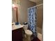 Bathroom includes a shower-tub combination, and vanity with sink and toilet at 22 Fairview Dr, Jonesboro, GA 30238