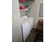 Functional laundry room with a washer and dryer, offering convenience for household chores at 22 Fairview Dr, Jonesboro, GA 30238