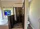 Beautiful bathroom with a tiled shower and a separate soaking tub with an adjacent powder room at 235 Pirkle Ct, Cumming, GA 30040