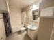 Standard bathroom featuring a shower-tub combination and a single sink vanity at 235 Pirkle Ct, Cumming, GA 30040