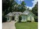 Charming home with a well-manicured front yard and a welcoming entrance at 235 Pirkle Ct, Cumming, GA 30040