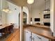 An open transition into a living room with high ceilings and a fireplace at 235 Pirkle Ct, Cumming, GA 30040