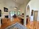 Inviting living room with hardwood floors, fireplace, and ample natural light at 235 Pirkle Ct, Cumming, GA 30040