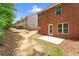 A brick townhouse includes a cozy patio and small yard, perfect for low-maintenance outdoor enjoyment and relaxing at 2714 Haynescrest Dr, Grayson, GA 30017