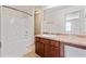 Bathroom featuring a combination bathtub and shower, and a single sink at 2714 Haynescrest Dr, Grayson, GA 30017