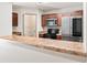 Well-lit kitchen featuring stainless steel appliances, brown cabinets and stone countertops at 2714 Haynescrest Dr, Grayson, GA 30017