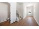 Bright foyer with stylish hardwood floors, access to a half bath, and staircase to the upper level at 2975 Jefferson St, Austell, GA 30106