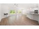 Spacious living room features wood-look floors and views of backyard at 2975 Jefferson St, Austell, GA 30106