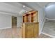 Wet bar with granite countertop, custom cabinets and a wine rack at 6010 Somerset Ct, Suwanee, GA 30024