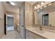 En Suite bathroom with marble floors and modern vanity at 6010 Somerset Ct, Suwanee, GA 30024