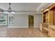 Dining room featuring tile floors, a built-in bar, and natural light at 6010 Somerset Ct, Suwanee, GA 30024