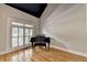 Sitting room featuring hardwood floors and view of the surrounding neighborhood at 6010 Somerset Ct, Suwanee, GA 30024