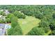 Expansive community green space is visible, including a large, well-manicured lawn at 12160 Oak Hollow Way, Alpharetta, GA 30005
