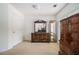 Bedroom featuring a full set of wooden furniture and neutral carpeting at 1900 Green Oak Cir, Lawrenceville, GA 30043