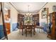 Elegant dining room featuring classic wooden furniture and traditional decor at 1900 Green Oak Cir, Lawrenceville, GA 30043