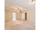 A spacious main bedroom featuring a tray ceiling and multiple windows at 219 Sleepy Way, Canton, GA 30114