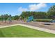 Community playground featuring colorful slides, swings, and ample play space for enjoyment at 219 Sleepy Way, Canton, GA 30114